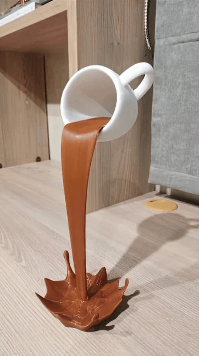 Floating Spilling Coffee Cup Sculpture